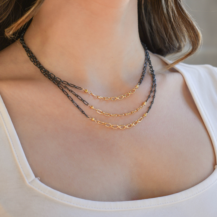 Two Tone Graduated Triple Chain Necklace
