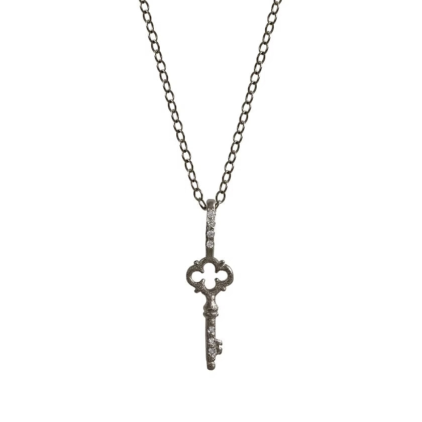 Quatrefoil Key Charm