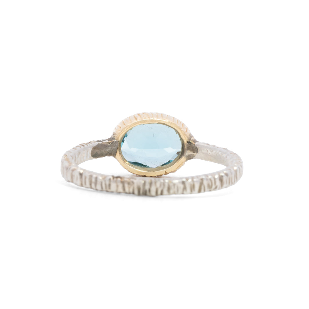 Small Oval Faceted Blue Topaz Ring