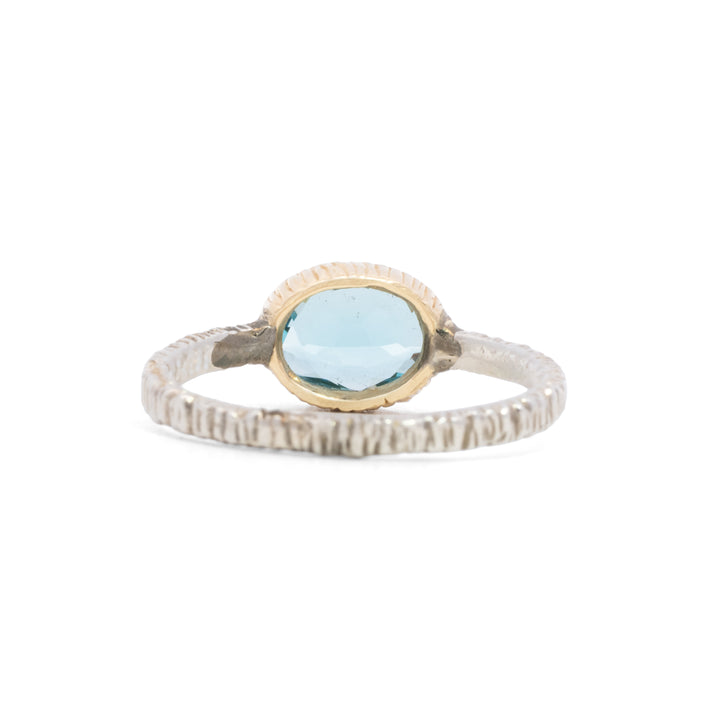 Small Oval Faceted Blue Topaz Ring