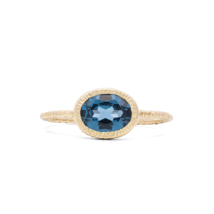 Small Oval Faceted Blue Zircon Ring