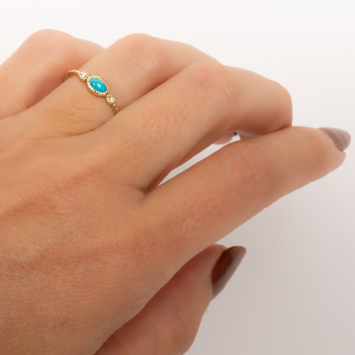 Small Oval Turquoise with Two Side Diamonds Ring