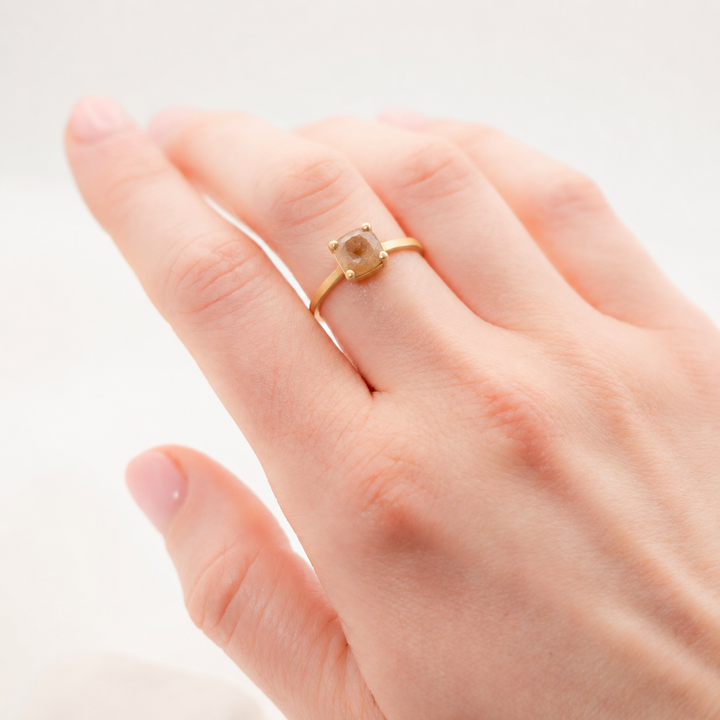 Four Prong Opaque Diamond Ring