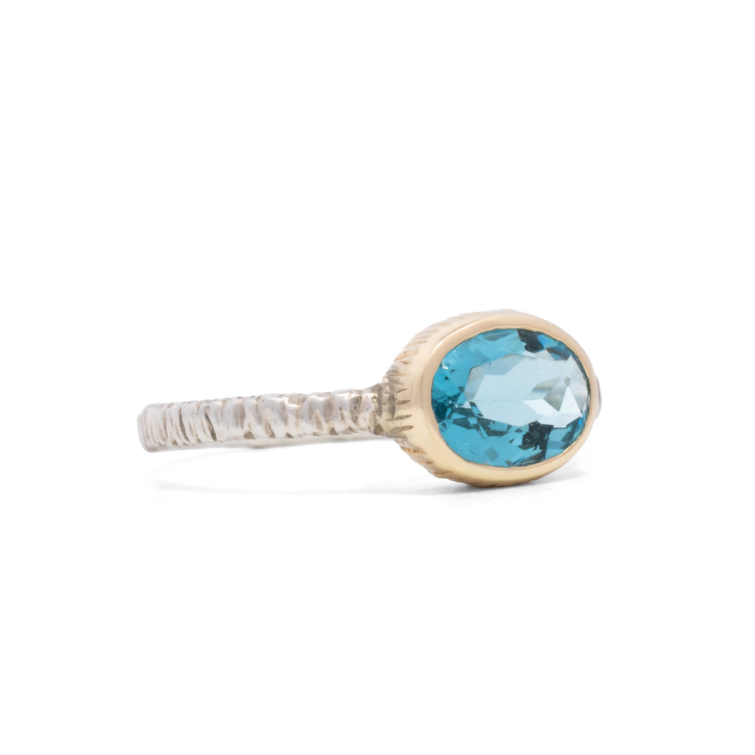 Small Oval Faceted Blue Topaz Ring
