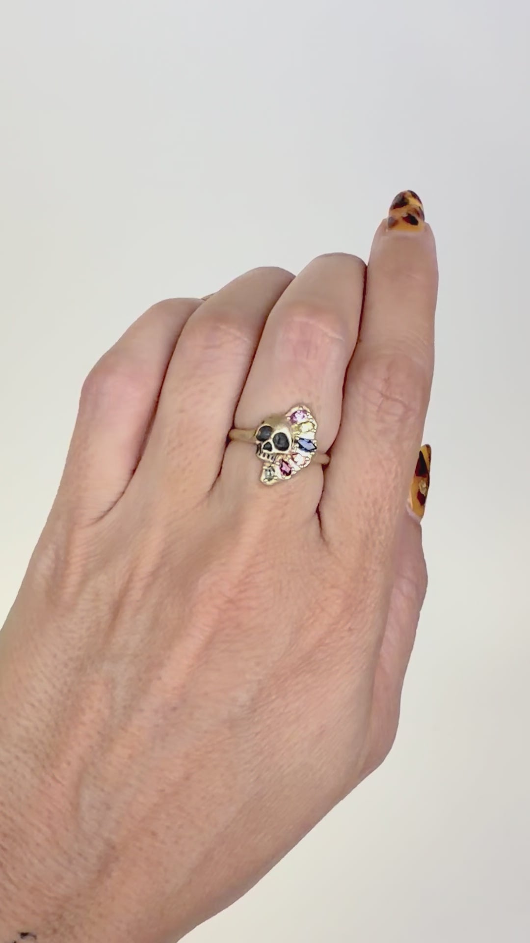 Memento Mori skull ring with sapphires