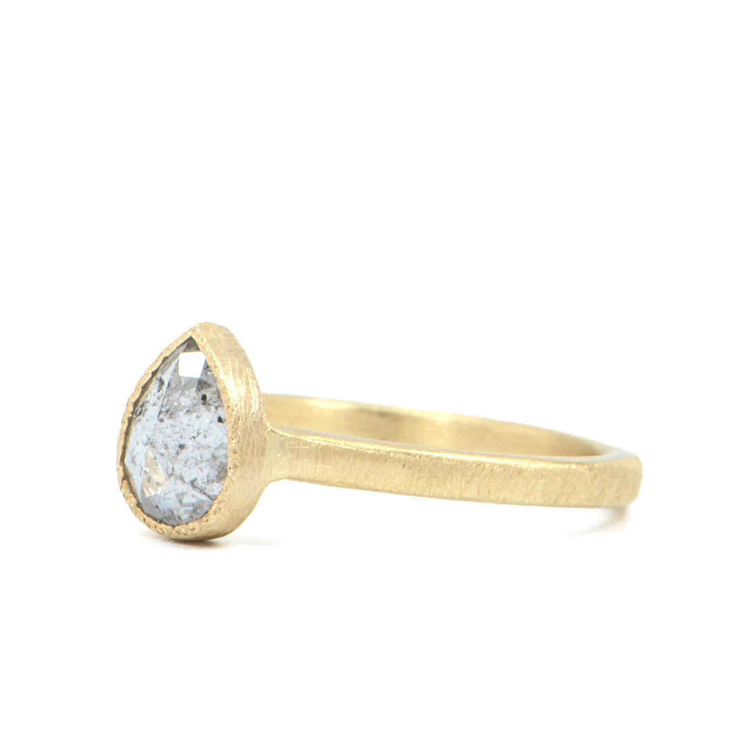 Grey Bezel Set Pear Diamond Ring