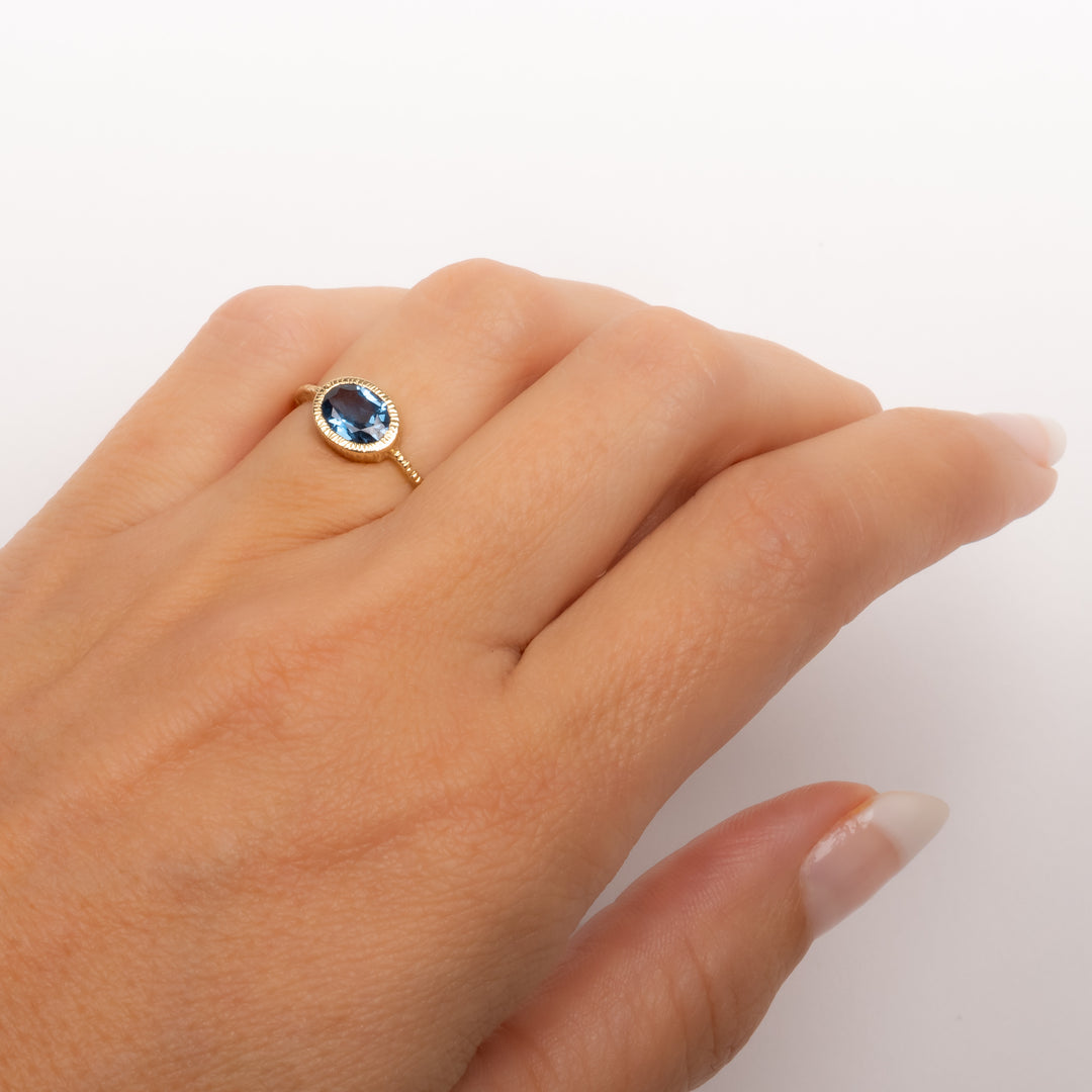 Small Oval Faceted Blue Zircon Ring
